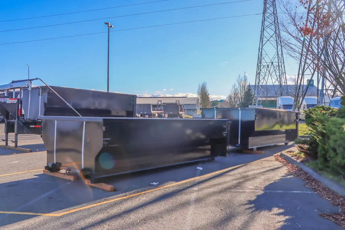 Roll-off dumpster ready for waste disposal at job site for 6 Yard Dumpster Rental in Logan